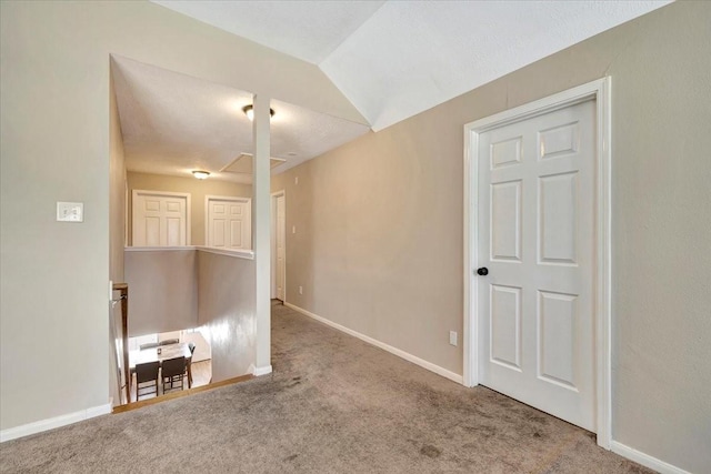 4235 Park Ridge Dr, Pasadena, TX 77504 - carpeted empty room with baseboards and vaulted ceiling
