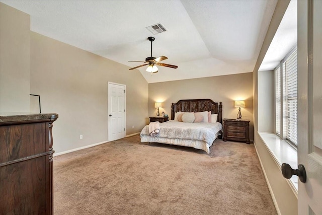 4235 Park Ridge Dr, Pasadena, TX 77504 - bedroom featuring light colored carpet, vaulted ceiling, and a ceiling fan