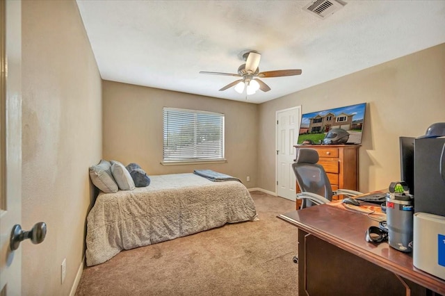4235 Park Ridge Dr, Pasadena, TX 77504 - carpeted bedroom with an office area and a ceiling fan