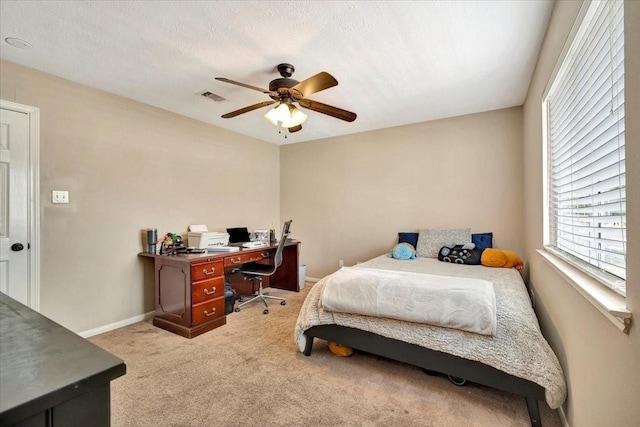 4235 Park Ridge Dr, Pasadena, TX 77504 - bedroom with a desk, carpet flooring, and ceiling fan