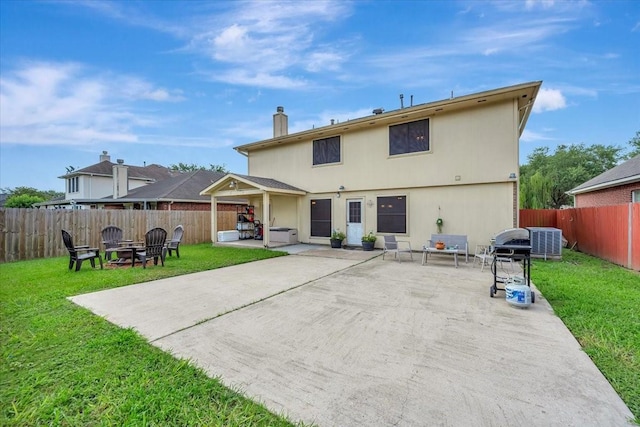 4235 Park Ridge Dr, Pasadena, TX 77504 - rear view of property featuring a patio area, a fenced backyard, an outdoor fire pit, and a chimney