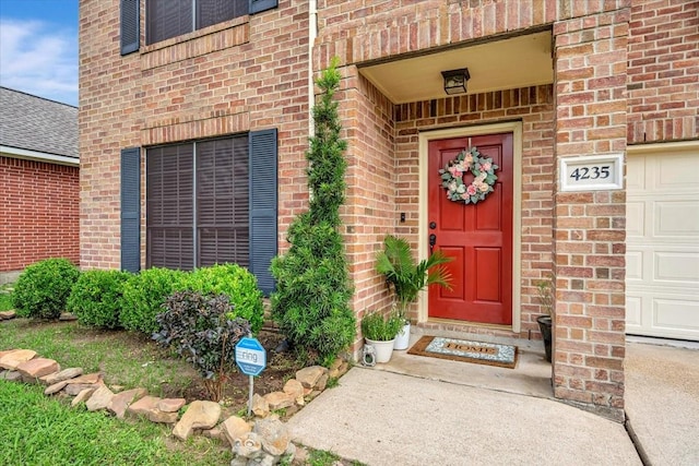 4235 Park Ridge Dr, Pasadena, TX 77504 - property entrance featuring brick siding and a garage