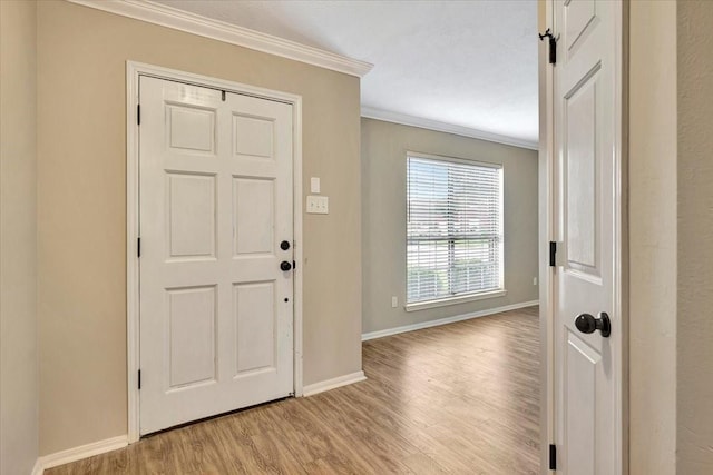 4235 Park Ridge Dr, Pasadena, TX 77504 - entrance foyer with ornamental molding and light wood-style floors