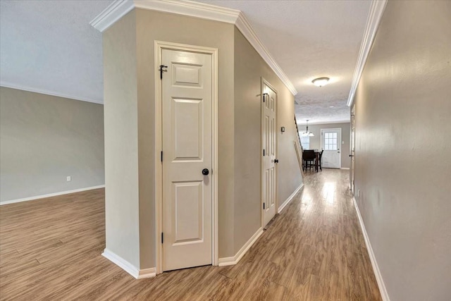 4235 Park Ridge Dr, Pasadena, TX 77504 - corridor featuring crown molding and wood finished floors