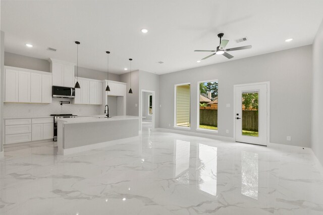 3518 Misty Moss, Montgomery, TX 77356 - unfurnished living room featuring a sink, light marble finish flooring, recessed lighting, a ceiling fan, and baseboards