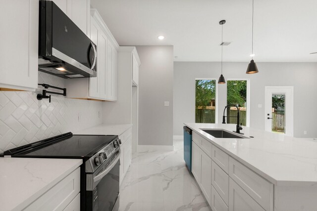 3518 Misty Moss, Montgomery, TX 77356 - kitchen featuring stainless steel microwave, black electric range oven, a sink, dishwasher, and decorative backsplash
