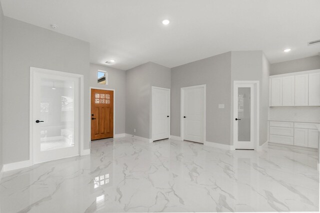 3518 Misty Moss, Montgomery, TX 77356 - foyer entrance with light marble finish flooring, baseboards, and recessed lighting
