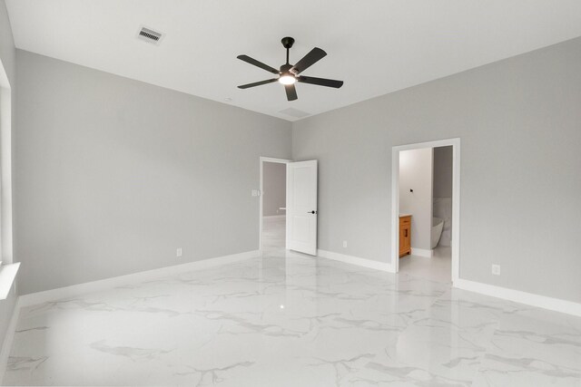 3518 Misty Moss, Montgomery, TX 77356 - unfurnished bedroom featuring light marble finish flooring, baseboards, ensuite bath, and ceiling fan
