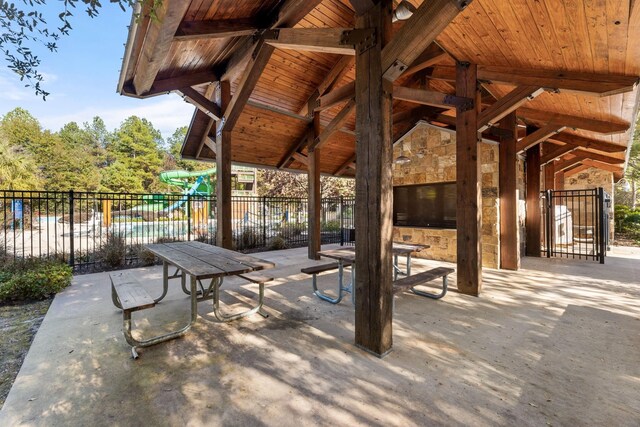 454 Patina Dr, Montgomery, TX 77316 - view of patio featuring a playground
