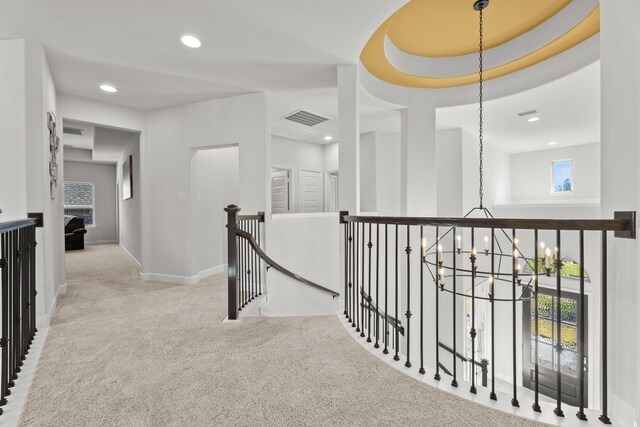 454 Patina Dr, Montgomery, TX 77316 - hall featuring a chandelier, an upstairs landing, carpet flooring, recessed lighting, and baseboards
