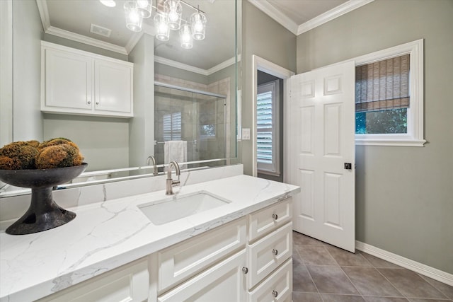 5710 Logan Ln, Houston, TX 77007 - full bath featuring vanity, a shower stall, baseboards, tile patterned flooring, and ornamental molding