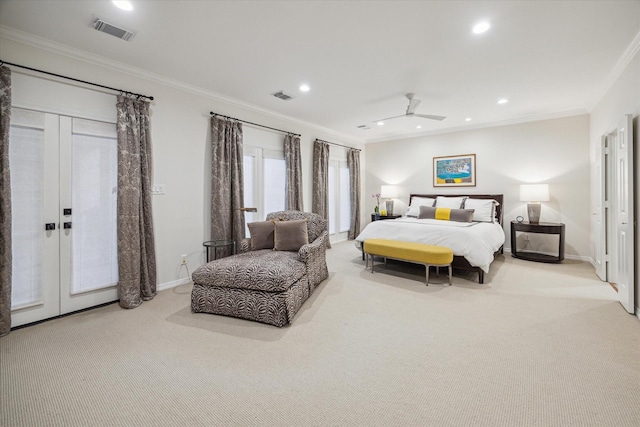 5710 Logan Ln, Houston, TX 77007 - bedroom with carpet flooring, crown molding, recessed lighting, baseboards, and french doors