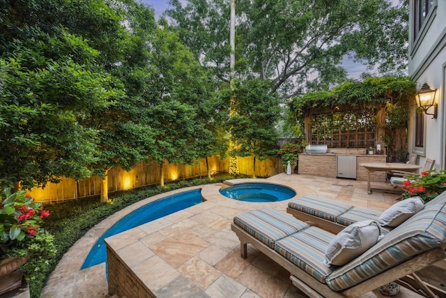 5710 Logan Ln, Houston, TX 77007 - view of pool with a fenced backyard, a patio area, and an in-ground hot tub