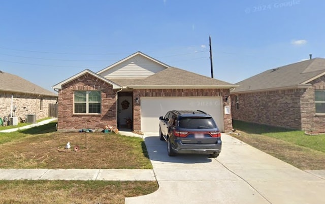 5426 Redwood Summit Ln, Katy, TX 77449 - ranch-style home featuring concrete driveway, a garage, brick siding, cooling unit, and a front lawn