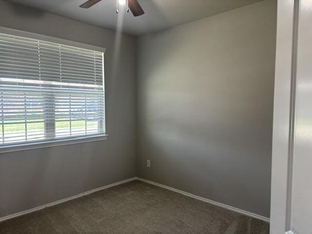 5426 Redwood Summit Ln, Katy, TX 77449 - carpeted empty room with a ceiling fan and baseboards