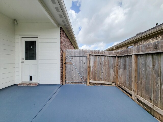 5426 Redwood Summit Ln, Katy, TX 77449 - view of patio with a gate