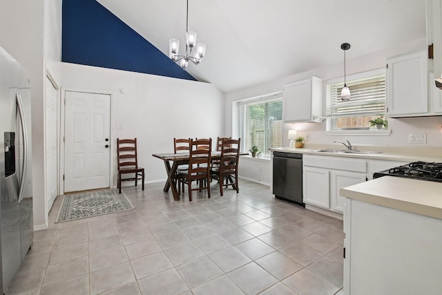 5551 Fawn Trail Ln, Humble, TX 77346 - kitchen with dishwasher, stainless steel fridge with ice dispenser, a sink, light countertops, and high vaulted ceiling