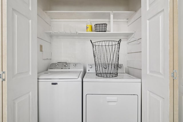 5551 Fawn Trail Ln, Humble, TX 77346 - laundry room featuring washer and dryer