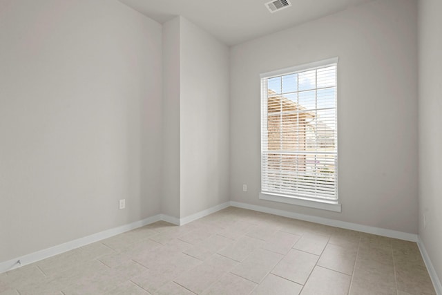 207 Little Dog Dr, Montgomery, TX 77356 - empty room featuring light tile patterned floors and baseboards