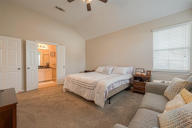 20904 Sunrise Pine View Ln, Katy, TX 77450 - bedroom with light carpet, lofted ceiling, ensuite bathroom, and a ceiling fan