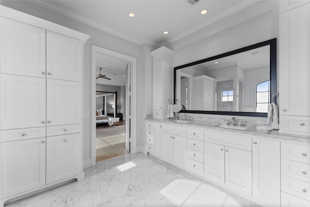 1705 Michigan St, Houston, TX 77006 - full bathroom with double vanity, ensuite bathroom, marble tiled floors, crown molding, and ceiling fan