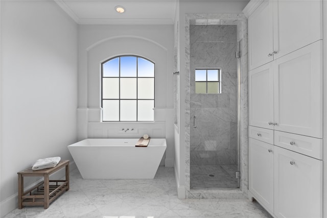 1705 Michigan St, Houston, TX 77006 - bathroom featuring a marble finish shower, a soaking tub, crown molding, marble look tile flooring, and recessed lighting