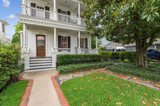 613 E 18th St, Houston, TX 77008 - view of front of property with a balcony and a porch