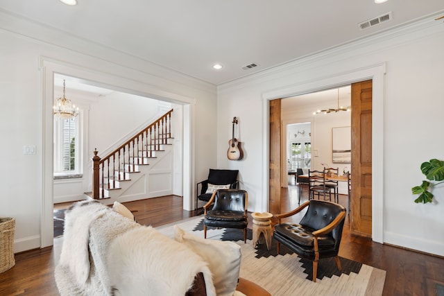 613 E 18th St, Houston, TX 77008 - living room featuring a chandelier, ornamental molding, stairway, dark wood-style flooring, and recessed lighting