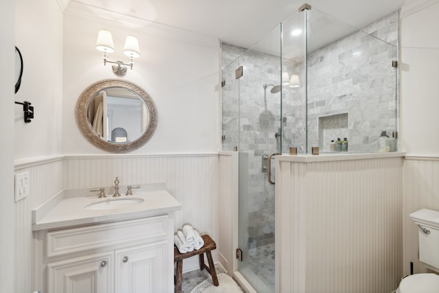 613 E 18th St, Houston, TX 77008 - full bath with vanity, a shower stall, toilet, and a wainscoted wall