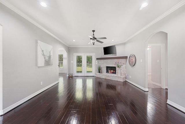 532 County Road 632, Dayton, TX 77535 - unfurnished living room with ceiling fan, arched walkways, wood-type flooring, baseboards, and recessed lighting