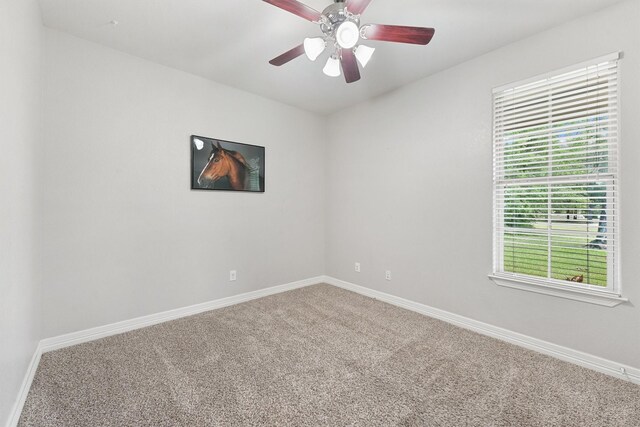 532 County Road 632, Dayton, TX 77535 - unfurnished room featuring carpet floors, baseboards, and a ceiling fan