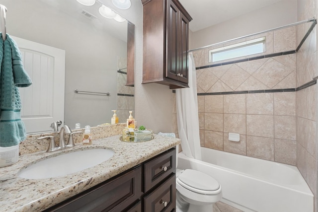 532 County Road 632, Dayton, TX 77535 - bathroom featuring vanity, shower / tub combo with curtain, and toilet