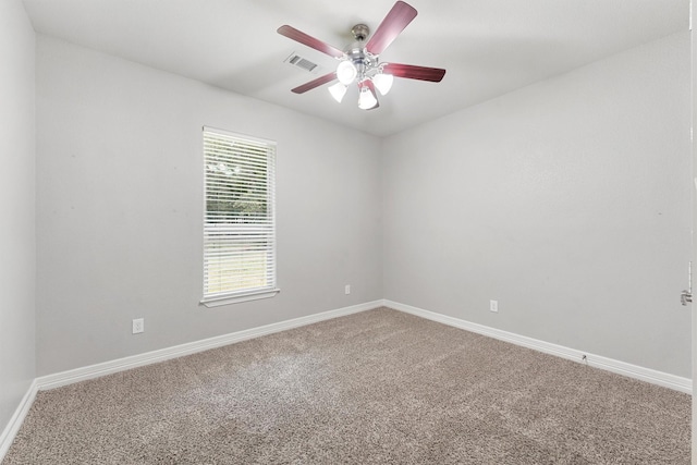 532 County Road 632, Dayton, TX 77535 - empty room with a ceiling fan, carpet floors, and baseboards