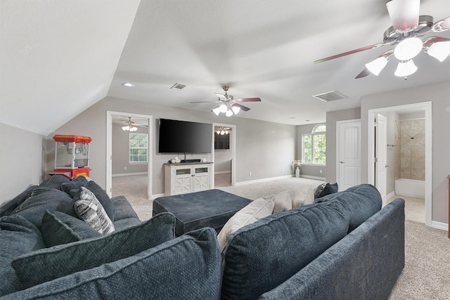 532 County Road 632, Dayton, TX 77535 - living room with light colored carpet, ceiling fan, baseboards, and lofted ceiling