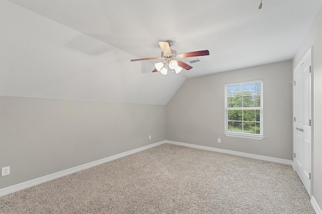 532 County Road 632, Dayton, TX 77535 - additional living space with light carpet, lofted ceiling, baseboards, and a ceiling fan