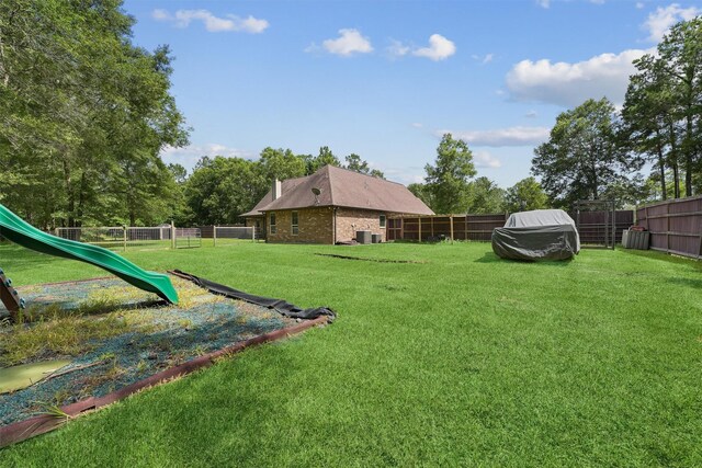 532 County Road 632, Dayton, TX 77535 - view of yard with a playground