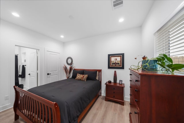 1503 Evelyn St, Houston, TX 77009 - bedroom with light wood-type flooring, recessed lighting, and baseboards