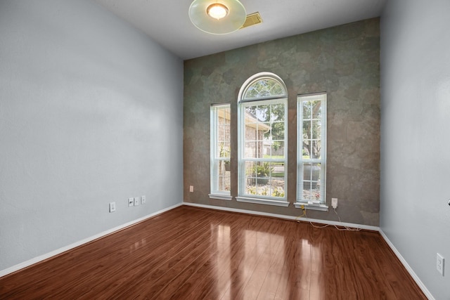 2723 Shelby Dr, Pearland, TX 77584 - empty room featuring wood finished floors and baseboards