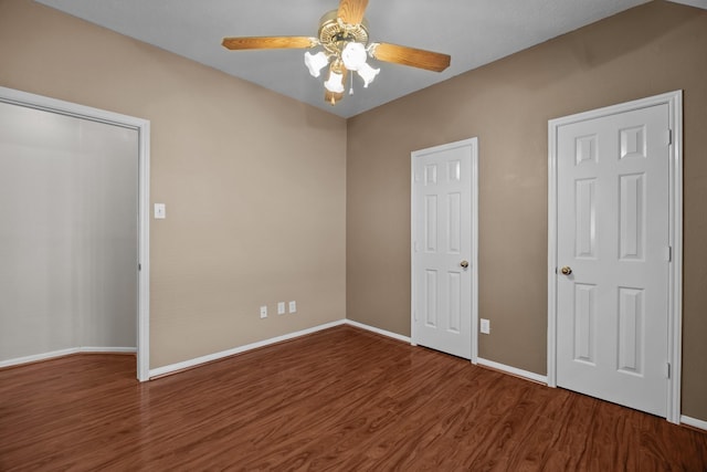 2723 Shelby Dr, Pearland, TX 77584 - unfurnished bedroom featuring wood finished floors, baseboards, and ceiling fan
