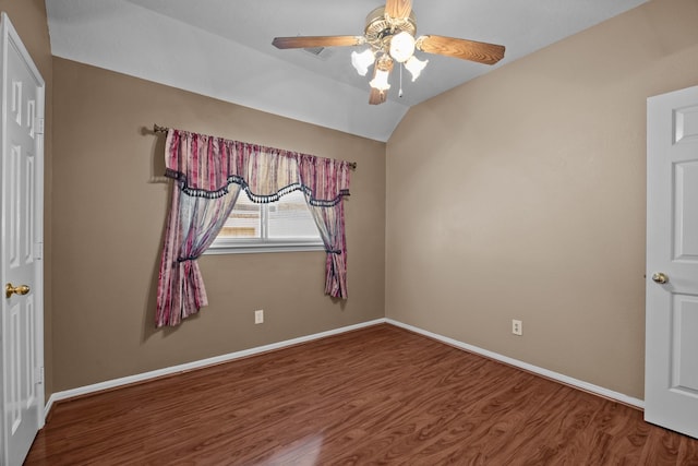 2723 Shelby Dr, Pearland, TX 77584 - empty room with wood finished floors, ceiling fan, baseboards, and lofted ceiling