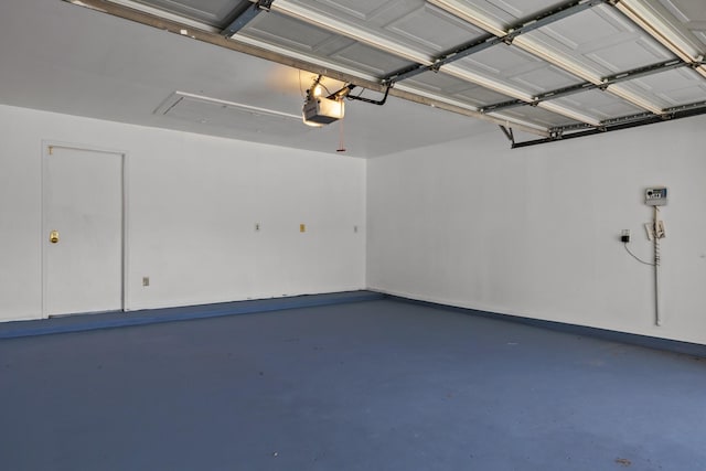 2723 Shelby Dr, Pearland, TX 77584 - garage with a garage door opener and baseboards