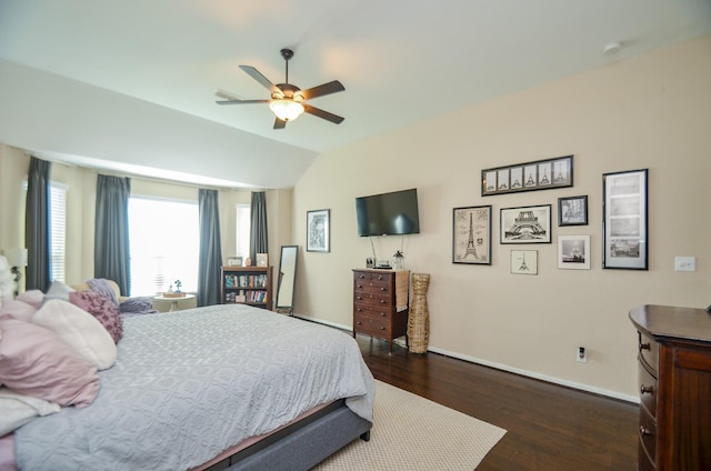 2109 Sunset Terrace Ln, Houston, TX 77089 - bedroom with dark wood finished floors, lofted ceiling, baseboards, and a ceiling fan