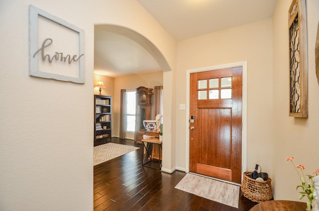 2109 Sunset Terrace Ln, Houston, TX 77089 - entryway with arched walkways, hardwood / wood-style flooring, and baseboards