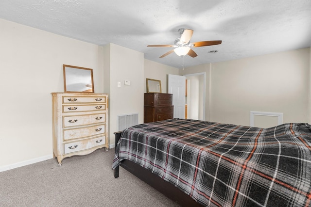 168 Bay Haven Blvd, Livingston, TX 77351 - bedroom featuring carpet floors, baseboards, and ceiling fan