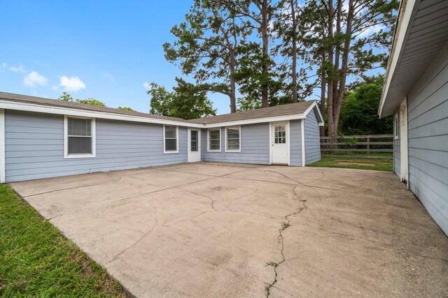 168 Bay Haven Blvd, Livingston, TX 77351 - rear view of house featuring a patio