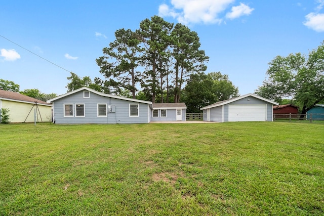 168 Bay Haven Blvd, Livingston, TX 77351 - back of property featuring a garage and an outdoor structure