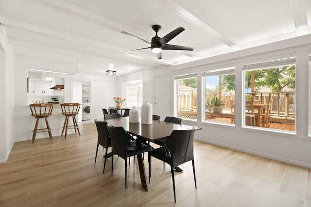 10907 Sagemeadow Ln, Houston, TX 77089 - dining space featuring washer / dryer, a ceiling fan, light wood-type flooring, beamed ceiling, and baseboards