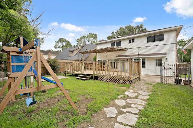 10907 Sagemeadow Ln, Houston, TX 77089 - back of house featuring a playground, a wooden deck, and a pergola