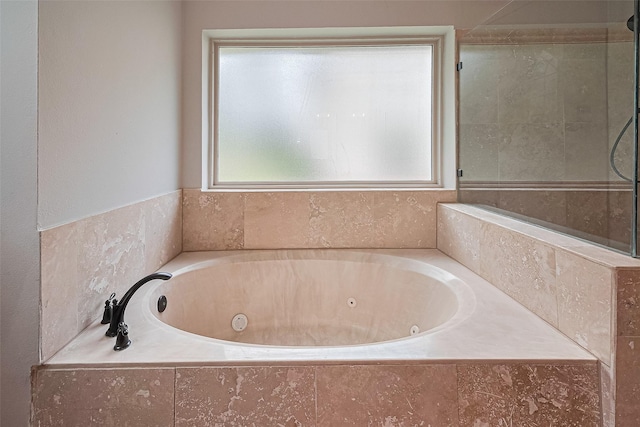 3406 Mesquite Dr, Sugar Land, TX 77479 - bathroom with plenty of natural light and a whirlpool tub