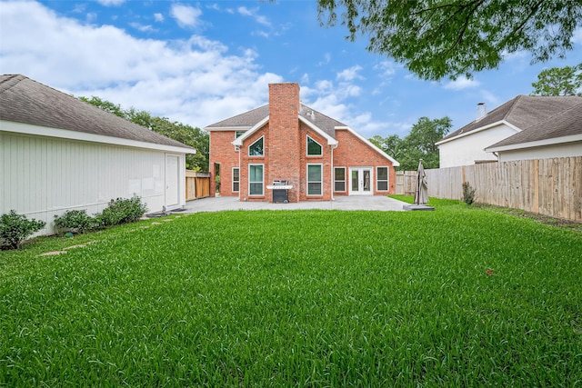 3406 Mesquite Dr, Sugar Land, TX 77479 - rear view of property featuring a patio, brick siding, and a chimney